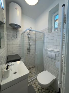 Eladó Lakás 1113 Budapest 11. kerület Budai csendes kis utcában felújított garzonlakás 