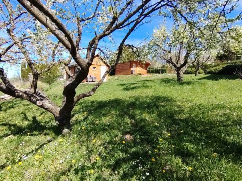 Eladó Telek 8960 Lenti Lenti-hegyen lankás gyümölcsös két faházzal, összközművel